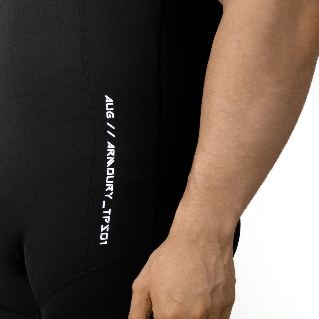 Athlete wearing compression weightlifting singlet designed for mobility and support during heavy compound lifts.