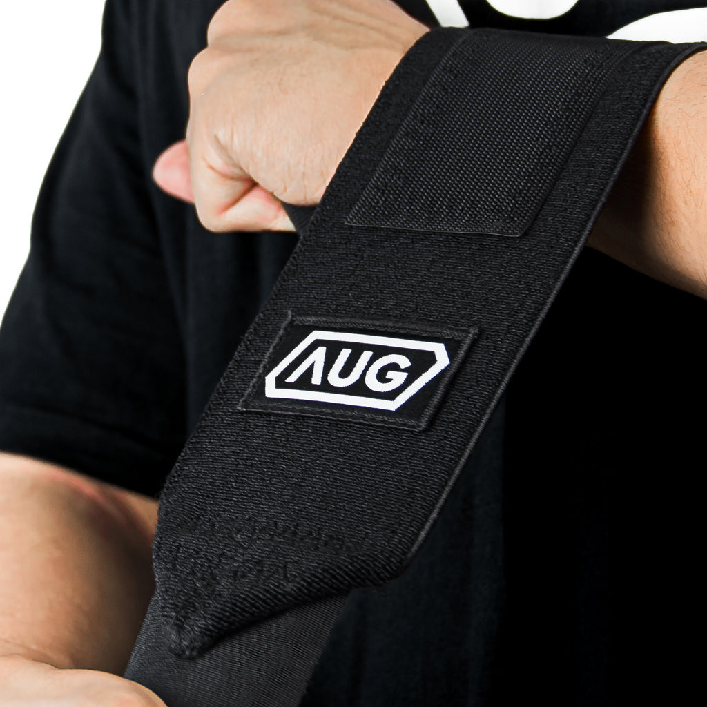 Powerlifting wrist wraps with reinforced 3.5mm nylon and double-row stitching for grip and support.