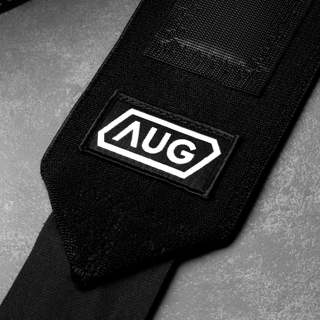 Powerlifting wrist wraps with reinforced 3.5mm nylon and double-row stitching for grip and support.