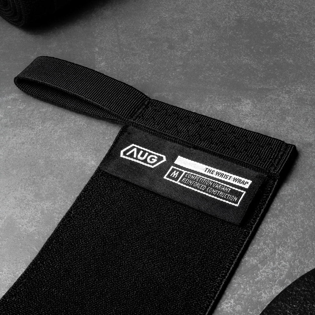 Powerlifting wrist wraps with reinforced 3.5mm nylon and double-row stitching for grip and support.
