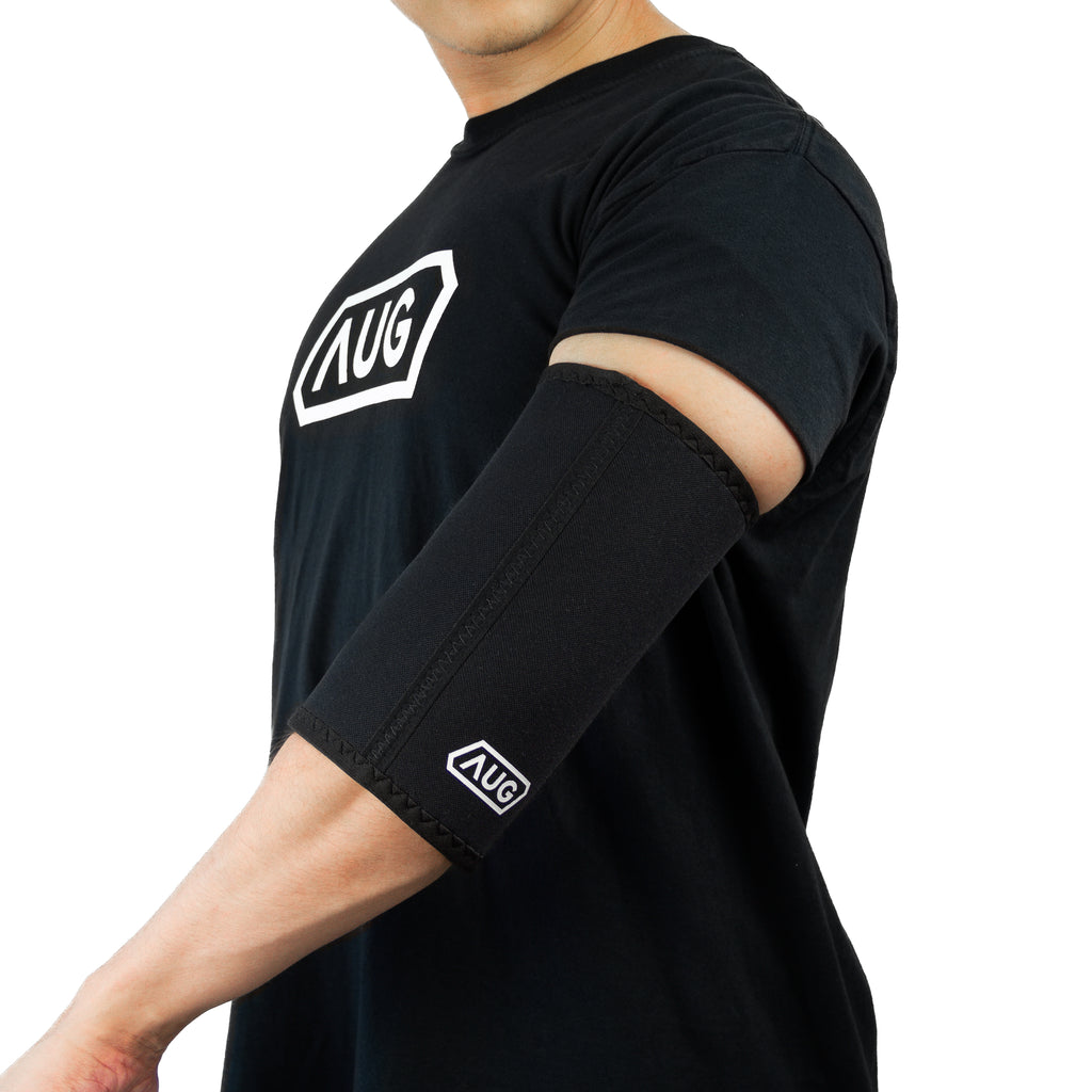 Elbow Sleeve for Powerlifting, Bodybuilding, Strongman and Strength Sports. Increase Bench Press Performance, Overhead Performance with Maximum Rebound. Made of Neoprene with dual 7mm by 5mm. Prevents injuries and supports warmth. Break Personal Records and excel in Competition. By the Augments Training Armoury - AUG 'AUG'. Augments critical pieces and forms part of the carbon collection. Stiffness and Density provides the highest-quality compression to the Elbow.